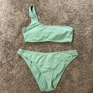 Green one shoulder bathing suit